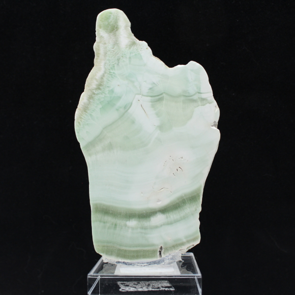 Fatia autêntica e polida de pedra de aragonita verde