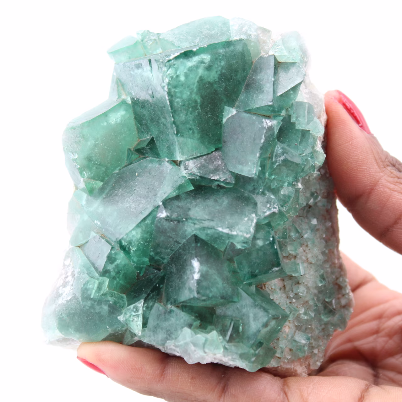 Cristais cúbicos de fluorita verde em fluorita maciça
